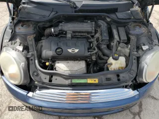 2011 MINI Hardtop z VIN WMWSU3C57BT095497, wystawiony jako Copart lot #55972645 z przebiegiem 132 947 mil mil oraz Szkody całkowita. Historia ofert i sprzedaży dostępna na DreamBid. Obrazek 11.