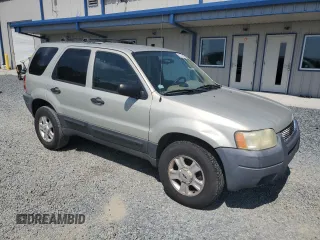 2004 Ford Escape XLT with VIN 1FMCU03134KB53192, listed as a Copart auction lot 62178075 with 223,637 mi miles and Salvage title. Bid and sale history available at DreamBid. Image 4.