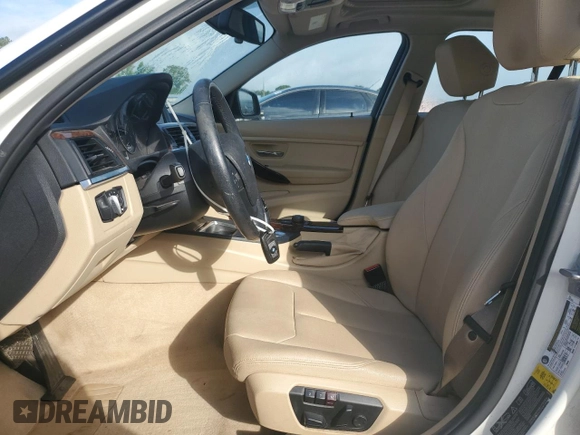 2014 BMW 3 Series 320i xDrive with VIN WBA3C3G52ENS67719, listed as a Copart auction lot 56863505 with 90,490 mi miles and Salvage title. Bid and sale history available at DreamBid. Image 7.