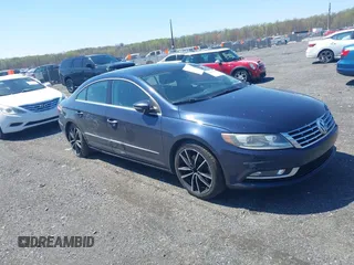 2014 Volkswagen CC Sport z VIN WVWBN7AN7EE511759, wystawiony jako IAAI lot #42002504 z przebiegiem 111 900 mil mil oraz . Historia ofert i sprzedaży dostępna na DreamBid. Obrazek 1.