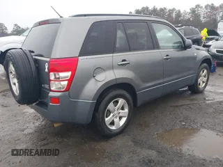 2007 Suzuki Grand Vitara XSport z VIN JS3TE944074201370, wystawiony jako IAAI lot #41874496 z przebiegiem 150 792 mil mil oraz . Historia ofert i sprzedaży dostępna na DreamBid. Obrazek 4.