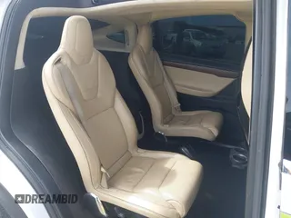 2016 Tesla Model X 70D with VIN 5YJXCBE24GF002020, listed as a IAAI auction lot 41799528 with 149,556 mi miles. Bid and sale history available at carsss.com. Image 8.