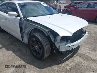 2014 Dodge Charger SXT z VIN 2C3CDXHG6EH267131, wystawiony jako IAAI lot #42321246 z przebiegiem 95 385 mil mil oraz . Historia ofert i sprzedaży dostępna na DreamBid. Obrazek 6.
