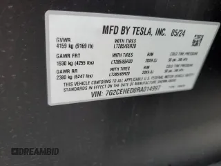 2024 Tesla Cybertruck z VIN 7G2CEHED0RA014997, wystawiony jako Copart lot #82289564 z przebiegiem Nie podano mil oraz Szkody całkowita. Historia ofert i sprzedaży dostępna na DreamBid. Obrazek 13.