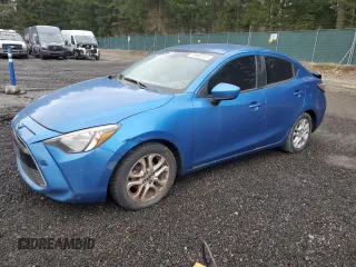 2016 Scion iA z VIN 3MYDLBZVXGY142781, wystawiony jako Copart lot #51987175 z przebiegiem 129 288 mil mil oraz Nie do naprawy • Non repairable. Historia ofert i sprzedaży dostępna na DreamBid. Obrazek 1.