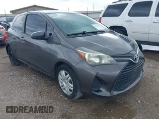2015 Toyota Yaris L with VIN VNKJTUD33FA054166, listed as a IAAI auction lot 41993354 with 98,657 mi miles. Bid and sale history available at carsss.com. Image 1.