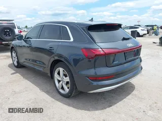 2019 Audi e-tron Premium Plus with VIN WA1LABGE6KB012565, listed as a IAAI auction lot 42220663 with 48,804 mi miles and . Bid and sale history available at DreamBid. Image 3.