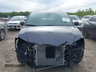 2019 Dodge Grand Caravan GT z VIN 2C4RDGEG8KR674402, wystawiony jako IAAI lot #42311861 z przebiegiem 118 451 mil mil oraz . Historia ofert i sprzedaży dostępna na DreamBid. Obrazek 13.