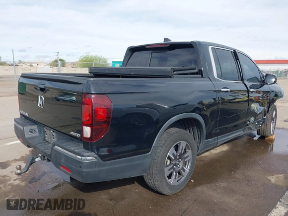 2017 Honda Ridgeline RTL-E with VIN 5FPYK3F7XHB030565, listed as a IAAI auction lot 41795386 with 79,252 mi miles and . Bid and sale history available at DreamBid. Image 4.