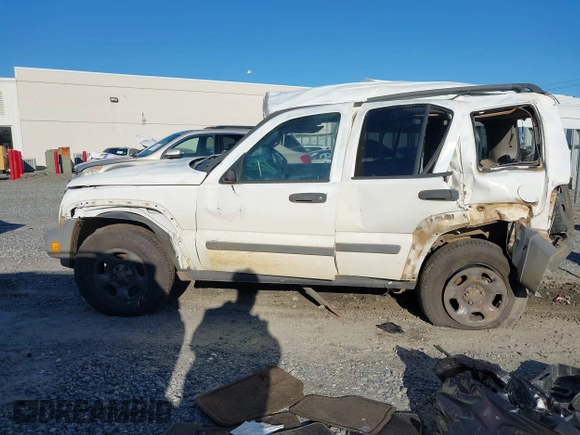 2005 Jeep Liberty Sport with VIN 1J4GK48KX5W679070, listed as a IAAI auction lot 41807899 with 157,726 mi miles. Bid and sale history available at carsss.com. Image 14.