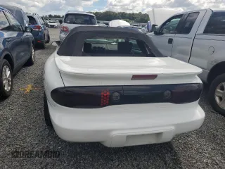 2001 Pontiac Firebird Firebird z VIN 2G2FS32K912126317, wystawiony jako Copart lot #74510454 z przebiegiem Nie podano mil oraz Szkody całkowita. Historia ofert i sprzedaży dostępna na DreamBid. Obrazek 6.