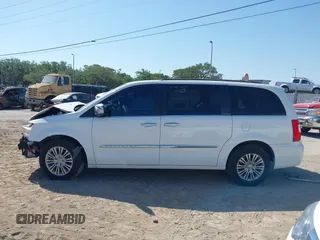 2015 Chrysler Town & Country Touring L with VIN 2C4RC1CG9FR547098, listed as a IAAI auction lot 42135624 with 61,364 mi miles and . Bid and sale history available at DreamBid. Image 15.