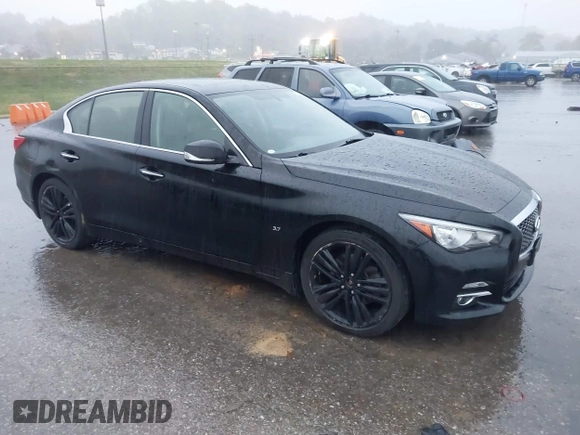 2015 Infiniti Q50 Premium z VIN JN1BV7ARXFM412382, wystawiony jako IAAI lot #40776813 z przebiegiem 66 406 mil mil oraz . Historia ofert i sprzedaży dostępna na DreamBid. Obrazek 1.