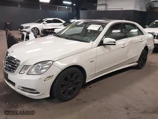 2012 Mercedes-Benz E-Class E 350 Luxury with VIN WDDHF8JB9CA557669, listed as a IAAI auction lot 41869888 with 124,187 mi miles. Bid and sale history available at carsss.com. Image 17.