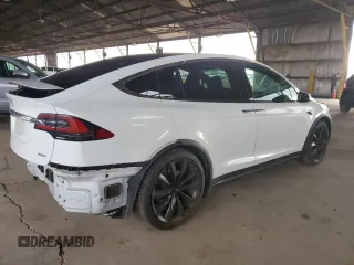 2018 Tesla Model X 75D with VIN 5YJXCBE23JF133589, listed as a Copart auction lot 55573715 with 89,234 mi miles and Salvage Title. Bid and sale history available at DreamBid. Image 3.