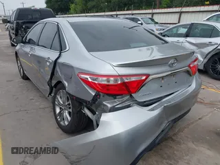 2015 Toyota Camry XLE with VIN 4T1BF1FK0FU960051, listed as a IAAI auction lot 42125452 with 117,047 mi miles and . Bid and sale history available at DreamBid. Image 3.