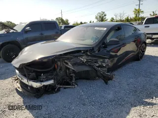 2022 Tesla Model S Plaid z VIN 5YJSA1E65NF489996, wystawiony jako Copart lot #57205325 z przebiegiem Nie podano mil oraz Szkoda całkowita • Salvage title. Historia ofert i sprzedaży dostępna na DreamBid. Obrazek 1.