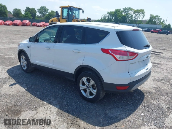 2014 Ford Escape SE with VIN 1FMCU9GX9EUC61521, listed as a IAAI auction lot 42535244 with 129,315 mi miles and . Bid and sale history available at DreamBid. Image 3.