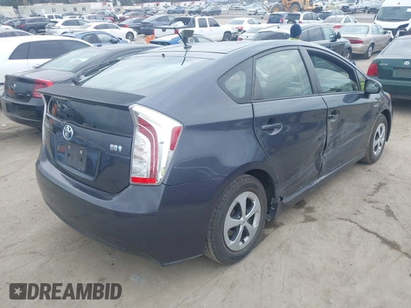 2013 Toyota Prius One z VIN JTDKN3DU4D5677392, wystawiony jako IAAI lot #42050842 z przebiegiem 169 732 mil mil oraz . Historia ofert i sprzedaży dostępna na DreamBid. Obrazek 4.
