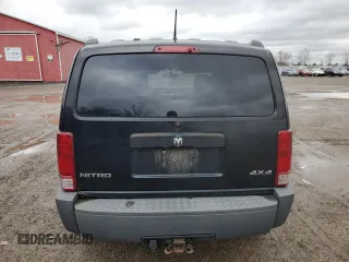 2007 Dodge Nitro SXT z VIN 1D8GU28K07W555205, wystawiony jako Copart lot #81165584 z przebiegiem 206 499 mil mil oraz Szkoda całkowita • Salvage title. Historia ofert i sprzedaży dostępna na DreamBid. Obrazek 6.