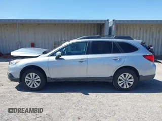 2016 Subaru Outback Premium with VIN 4S4BSAEC5G3221349, listed as a IAAI auction lot 42550233 with 119,762 mi miles and . Bid and sale history available at DreamBid. Image 14.
