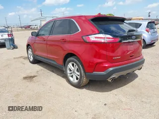 2020 Ford Edge SEL z VIN 2FMPK3J96LBA10912, wystawiony jako IAAI lot #42144667 z przebiegiem 88 722 mil mil oraz . Historia ofert i sprzedaży dostępna na DreamBid. Obrazek 3.