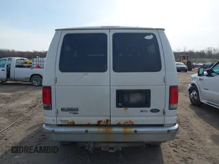 2014 Ford Econoline Passenger XL with VIN 1FBNE3BL8EDA40671, listed as a IAAI auction lot 42000919 with 399,196 mi miles and . Bid and sale history available at DreamBid. Image 14.