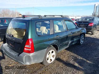 2003 Subaru Forester X with VIN JF1SG63673H757951, listed as a IAAI auction lot 41662103 with 168,433 mi miles. Bid and sale history available at carsss.com. Image 4.