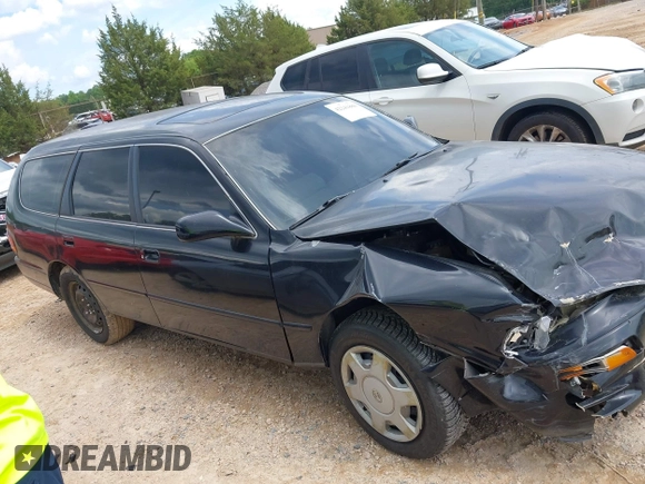 1996 Toyota Camry LE z VIN 4T1EF12K9TU117514, wystawiony jako IAAI lot #42241880 z przebiegiem 192 764 mil mil oraz . Historia ofert i sprzedaży dostępna na DreamBid. Obrazek 13.