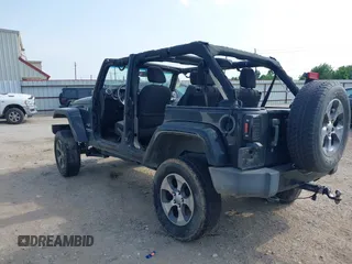 2016 Jeep Wrangler Unlimited Sahara with VIN 1C4BJWEG8GL333876, listed as a IAAI auction lot 42314351 with 163,889 mi miles and . Bid and sale history available at DreamBid. Image 3.