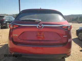 2018 Mazda CX-5 Grand Touring with VIN JM3KFADM5J0350937, listed as a Copart auction lot 46525965 with 59,478 mi miles and Salvage Title. Bid and sale history available at DreamBid. Image 6.