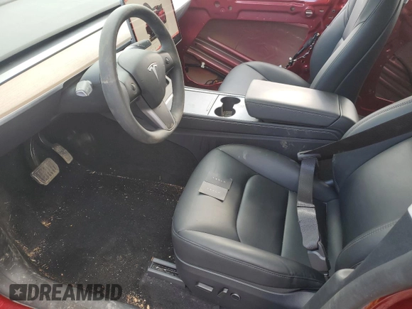 2024 Tesla Model Y Long Range z VIN 7SAYGDEE8RA302077, wystawiony jako Copart lot #52622465 z przebiegiem 11 830 mil mil oraz Szkoda całkowita • Salvage title. Historia ofert i sprzedaży dostępna na DreamBid. Obrazek 7.