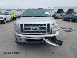 2012 Ford F-150 XL with VIN 1FTFW1CT2CKD51232, listed as a IAAI auction lot 41497343 with 300,216 mi miles. Bid and sale history available at carsss.com. Image 12.