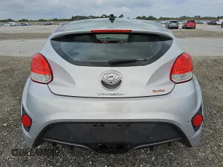 2014 Hyundai Veloster Turbo with VIN KMHTC6AE0EU211034, listed as a Copart auction lot 49711635 with 126,394 mi miles and Clean title. Bid and sale history available at DreamBid. Image 6.