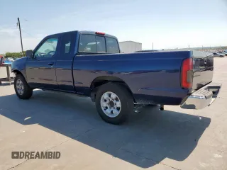 1999 Nissan Frontier XE with VIN 1N6DD26S9XC307893, listed as a Copart auction lot 66045605 with 239,269 mi miles and Salvage title. Bid and sale history available at DreamBid. Image 2.