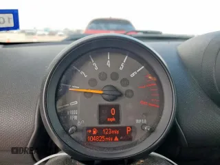 2015 MINI Countryman S z VIN WMWZC3C52FWT05252, wystawiony jako Copart lot #58559475 z przebiegiem 104 825 mil mil oraz Szkoda całkowita • Salvage title. Historia ofert i sprzedaży dostępna na DreamBid. Obrazek 9.