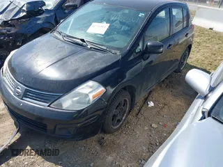 2009 Nissan Versa 1.8 SL with VIN 3N1BC13E19L497981, listed as a IAAI auction lot 41716561 with 176,722 mi miles. Bid and sale history available at carsss.com. Image 2.