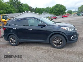 2017 Hyundai Santa Fe 2.4L z VIN 5XYZTDLBXHG431230, wystawiony jako IAAI lot #42302492 z przebiegiem 185 291 mil mil oraz . Historia ofert i sprzedaży dostępna na DreamBid. Obrazek 13.