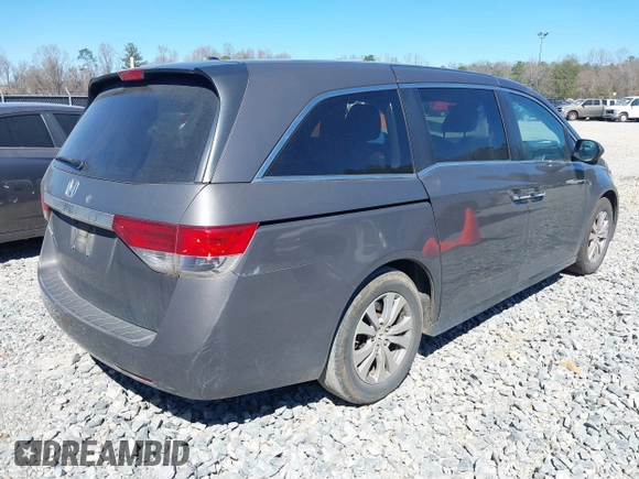 2014 Honda Odyssey EX-L with VIN 5FNRL5H61EB014695, listed as a IAAI auction lot 41694860 with 261,265 mi miles and . Bid and sale history available at DreamBid. Image 4.