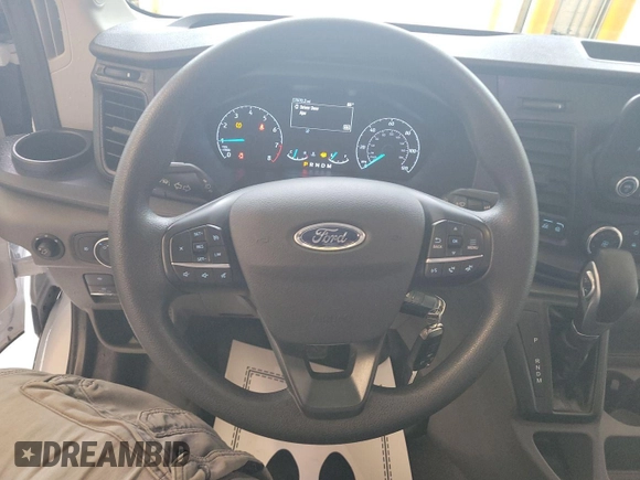 2023 Ford Transit Cargo с VIN 1FTBR1X89PKA75830, выставлен на аукционе IAAI как лот 42907933 с пробегом 17 668 миль миль и . История ставок и продаж доступна на DreamBid. Изображение 16.