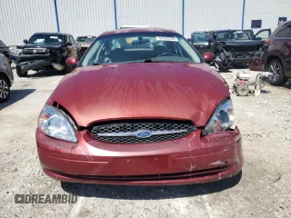 2002 Ford Taurus SES Standard z VIN 1FAFP55S02A219685, wystawiony jako Copart lot #52382425 z przebiegiem 91 800 mil mil oraz Nie do naprawy • Non repairable. Historia ofert i sprzedaży dostępna na DreamBid. Obrazek 5.