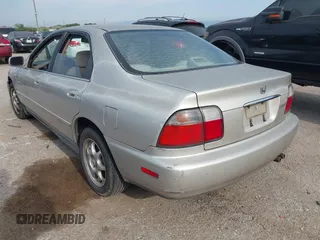 1996 Honda Accord Value with VIN 1HGCD5690TA212711, listed as a IAAI auction lot 42035289 with 184,592 mi miles and . Bid and sale history available at carsss.com. Image 3.