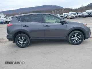 2018 Toyota RAV4 LE with VIN JTMBFREV4JJ742428, listed as a IAAI auction lot 41912813 with 114,159 mi miles. Bid and sale history available at carsss.com. Image 14.