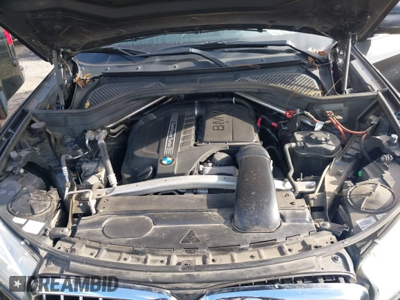 2014 BMW X5 sDrive35i with VIN 5UXKR2C56E0H32059, listed as a IAAI auction lot 41096908 with 124,322 mi miles. Bid and sale history available at carsss.com. Image 10.