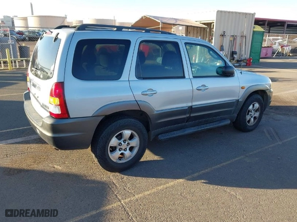 2004 Mazda Tribute LX with VIN 4F2YZ04174KM23373, listed as a IAAI auction lot 41392564 with 100,730 mi miles. Bid and sale history available at carsss.com. Image 4.