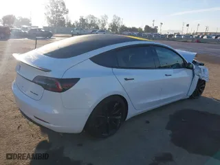 2018 Tesla Model 3 Long Range Battery with VIN 5YJ3E1EB0JF092440, listed as a IAAI auction lot 41881209 with 74,818 mi miles. Bid and sale history available at carsss.com. Image 4.