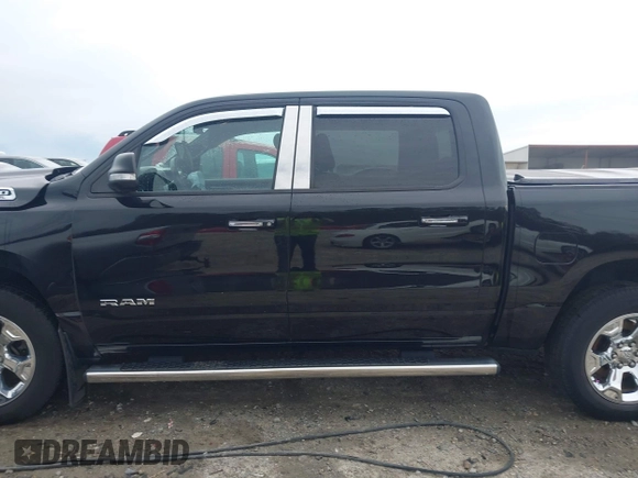 2019 Ram 1500 Big Horn/Lone Star with VIN 1C6SRFFT6KN569919, listed as a IAAI auction lot 41760605 with 181,105 mi miles. Bid and sale history available at carsss.com. Image 14.