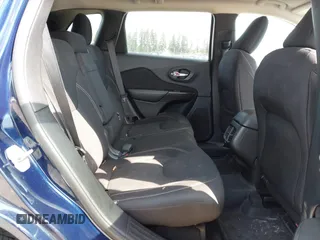 2015 Jeep Cherokee Latitude with VIN 1C4PJMCB0FW702535, listed as a IAAI auction lot 42149898 with 125,938 mi miles and . Bid and sale history available at carsss.com. Image 8.
