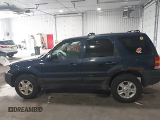 2003 Ford Escape XLT Popular with VIN 1FMYU03103KA06087, listed as a IAAI auction lot 42596326 with 210,441 mi miles and . Bid and sale history available at DreamBid. Image 14.