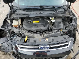 2016 Ford Escape Titanium with VIN 1FMCU0JX8GUA19696, listed as a Copart auction lot 46294145 with 99,165 mi miles and Salvage Title. Bid and sale history available at carsss.com. Image 11.